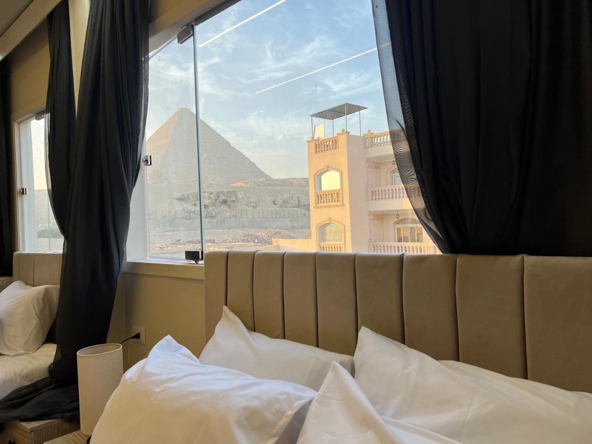 Blue Scarab Pyramids View Hotel Cairo Exterior photo